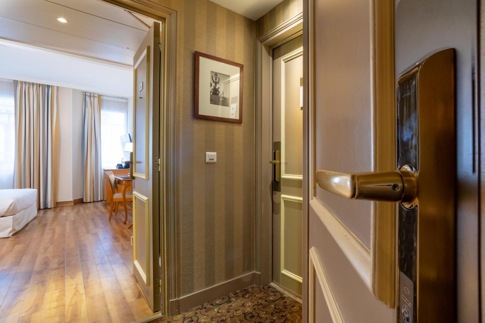 Hotel Etats Unis Opera París Habitación foto